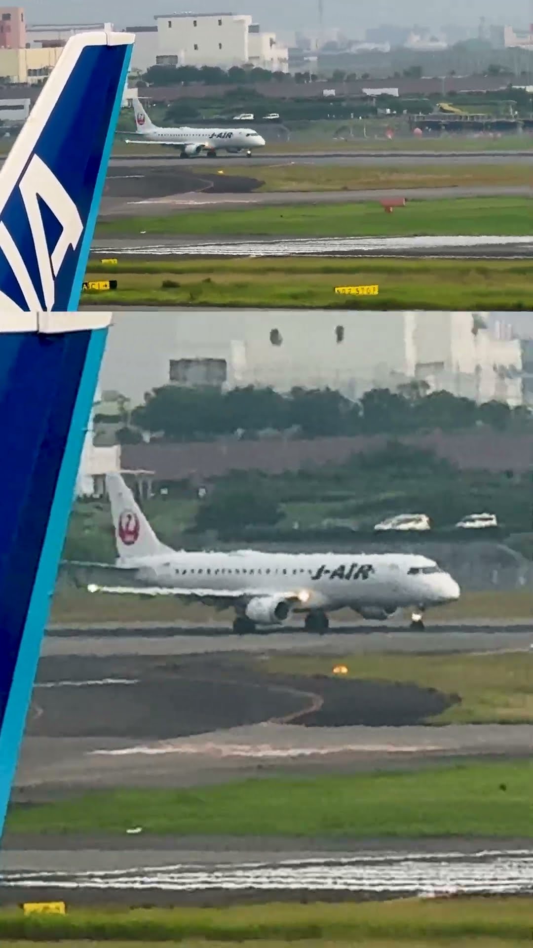 霞む大阪市内をバックに離陸、ギアアップしていくJ-AIR Embraer
