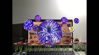 Demonstrating an AR postcard with 2 layers