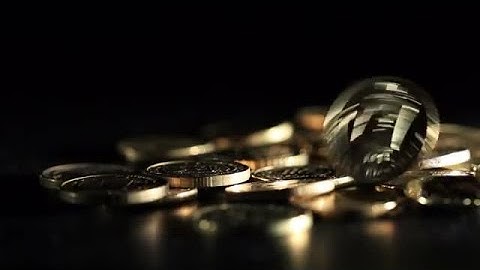 Coins Dropping On The Table Stock Video