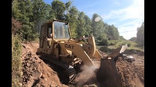 Cutting a mountain road Cat 943 track loader by Abrams Excavating 12,219 views 1 year ago 4 minutes, 22 seconds