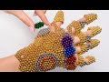Потрясающая перчатка Таноса, сделанная из магнитных бусин