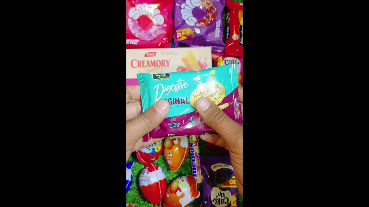 Satisfying Video ASMR unboxing candy chocolates and gems.