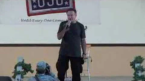 Robin Williams as troops "Retreat" at Camp Arifjan...
