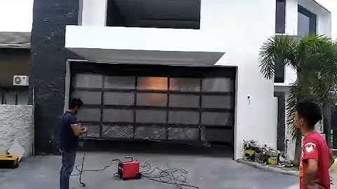 Automatic GLASS PANEL SECTIONAL GARAGE BY AEM DOOR AUTOMATION ACCESS SYSTEM AND SERVICES