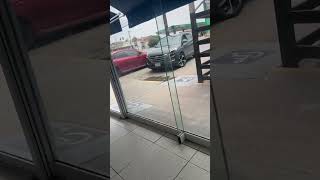 SUV Collides With Pole in Parking Lot