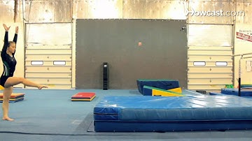 How to Do a Handstand Forward Roll | Gymnastics