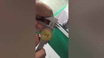 Automatic spring testing machine