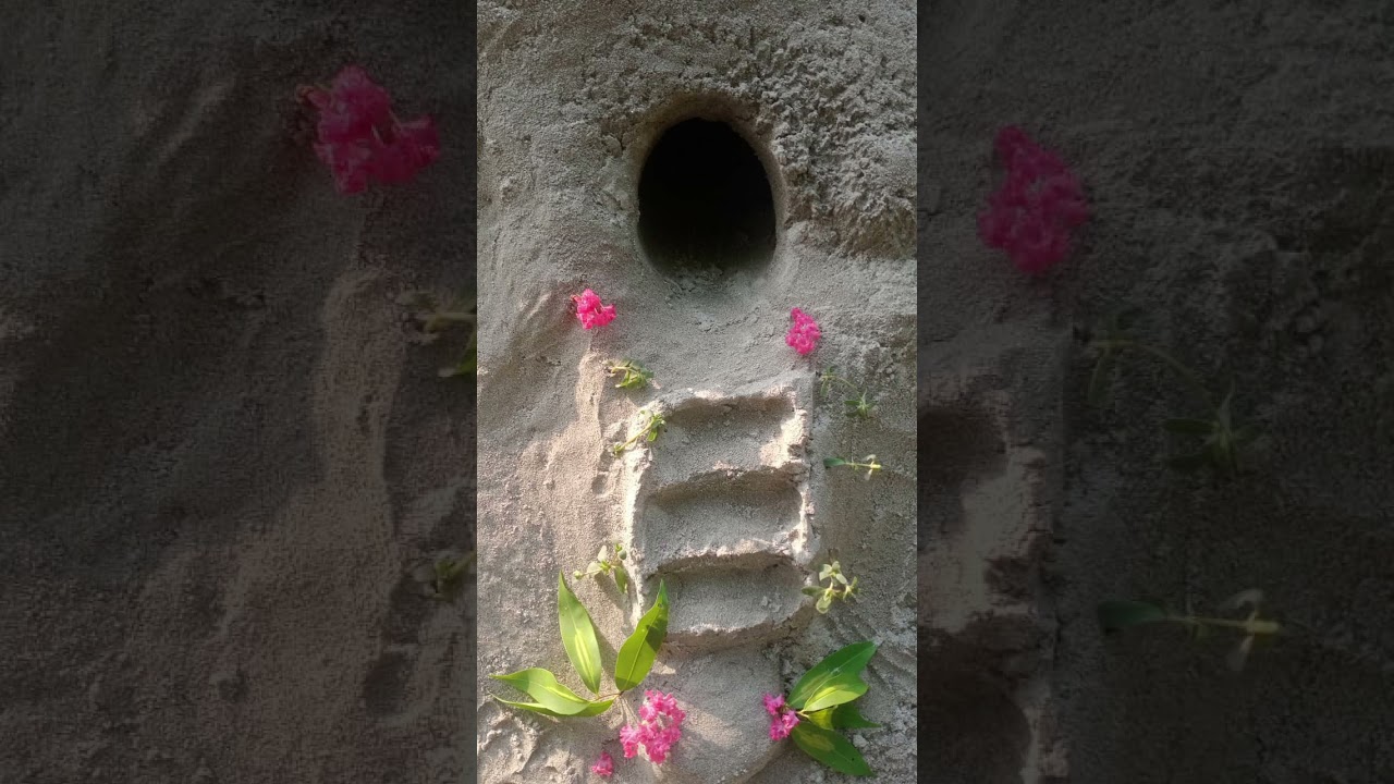 my handmade house in sand 