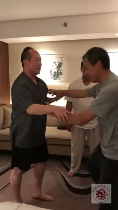 Teaching pushing hands in Guangzhou, China.