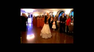 Groom sings first dance song to bride