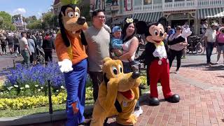 Mickey Mouse, Goofy and Pluto have fun on Main St. // Disneyland