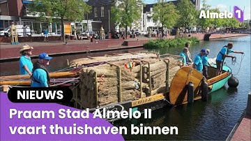 Praam Stad Almelo II vaart thuishaven binnen