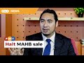 Putrajaya must halt sale of mahb shares to consortium says wan fayhsal