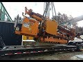 DRILL RIG -- Unloading in Ontario