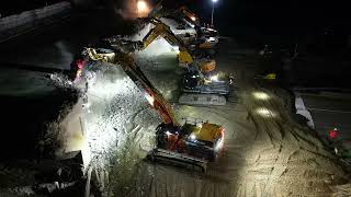 Cat 352 straight boom +Cat 352 UHD during bridge demolition