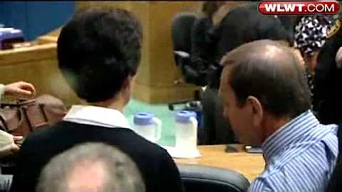 Schuler Handcuffed, Led From Court