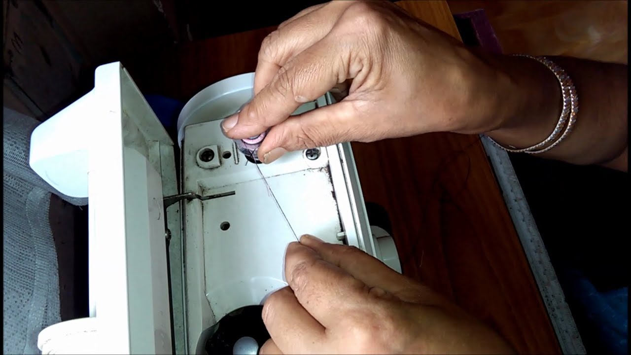 How to Wind a Bobbin using Needle Thread on Sewing Machine - YouTube