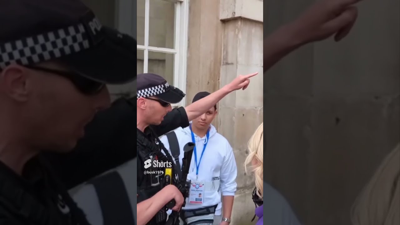 King's guard asks tourist to get the police