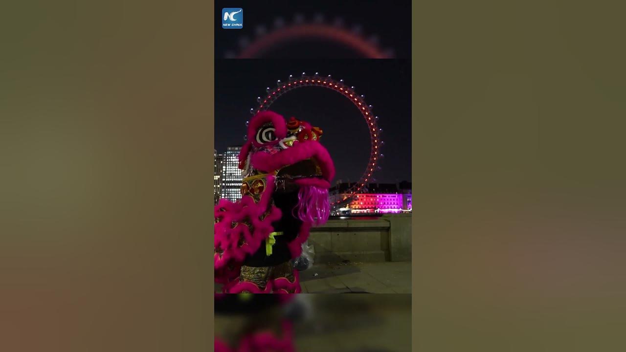 London Eye lit red, gold for Chinese New Year
