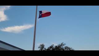 state state flag. wind blowing out of 2 different directions.