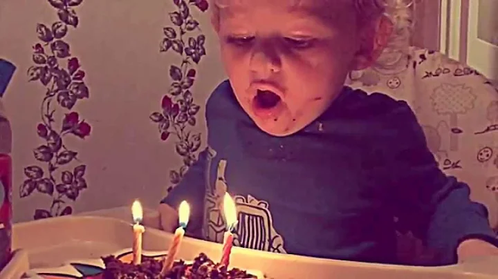 Two minutes of a 2yr-old blowing out candles in Slow Motion.