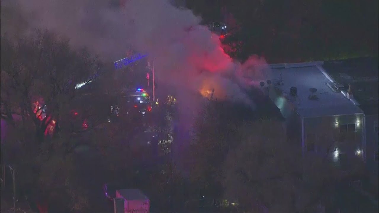 Firefighter injured after fire destroys abandoned building in South ...