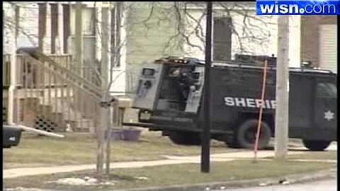 Raw Video: Shots Fired As Police Remove Woman From FDL Home