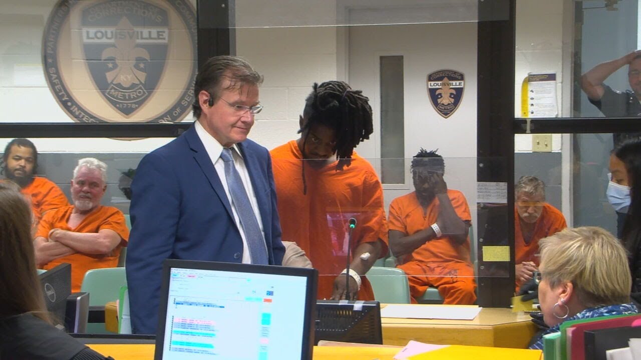 Man shot by Louisville police after refusing to drop gun appears in ...