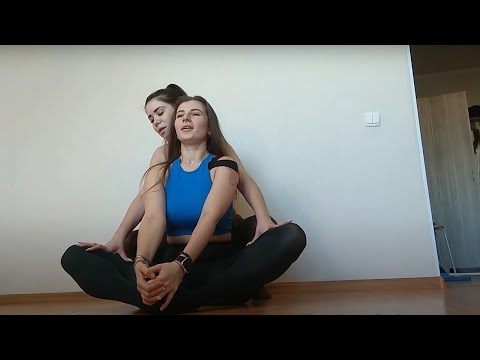 Yoga in colored tights with friend 