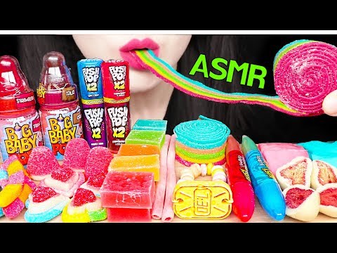 ASMR rainbow candy, sour sloths, rainbow twizzlers, nerd rope, wax lips, sour foam candy, ring pops,. 