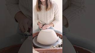 Trimming a large mixing bowl… #handmadeceramics #ceramics #pottery