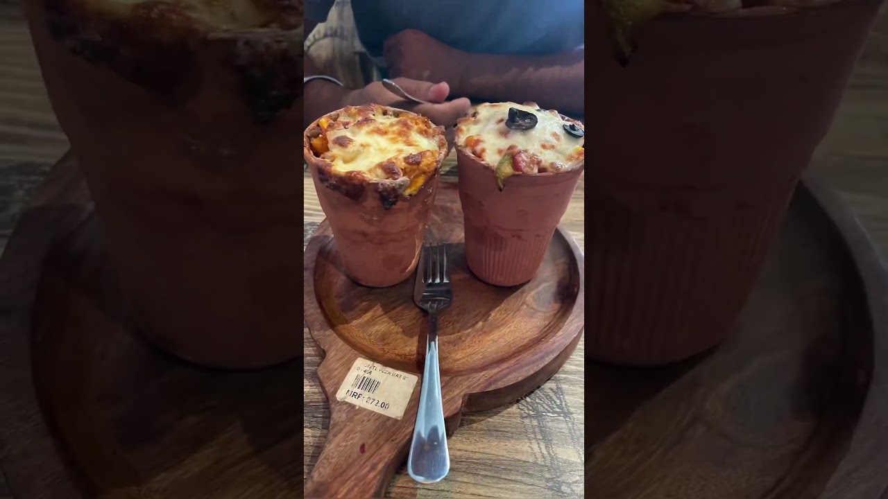 ⁣Viral Kulhad Pizza couple Jalandhar ft Mi Amor Trending Must try #kulhadpizza #trending #shorts