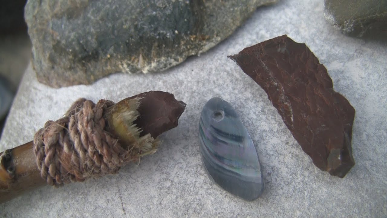 Flint knapping kit and shell bracelet.