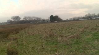 Flyduino Carbon fibre 'warthox' quadcopter flying at sunset