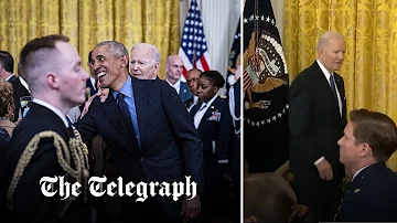 Biden appears 'lost' in White House event as guests swarm around Barack Obama instead