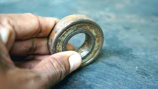 MAKING A RUSTY BEARING INTO A KNIFE!!!!!!