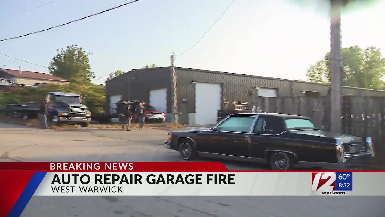 Crews extinguish fire at West Warwick auto repair garage - YouTube