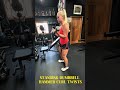 Standing dumbbell hammer curls twists