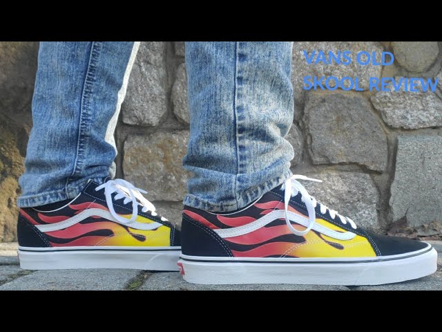 yellow old skool vans on feet