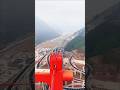 Red Tower overlooking the construction site #technology #bridge #mountains  #infrastructure