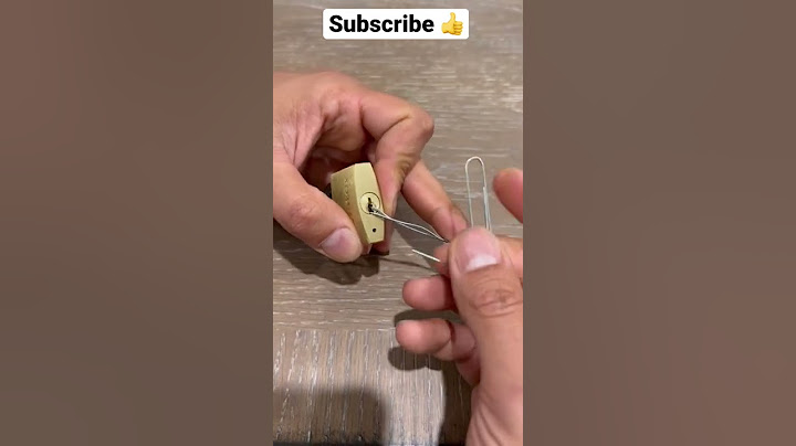 Pick open a lock with a paper clip #shorts