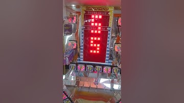 Stacker coin operated