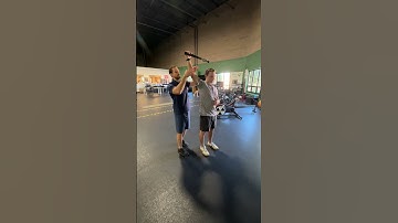 Cable External Rotation to Overhead Press with Rhythmic Stabilization