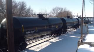 BNSF 9767 leads slow oil train