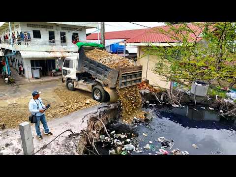 Fantastic First Start Landfill Flooded Area Project Use Dozer D20P Pushing Stone & 5Ton Truck Unload