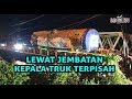 LEWAT JEMBATAN, KEPALA TRUK TERPISAH