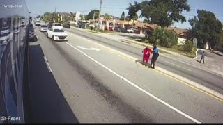 HART bus driver helps woman cross the road