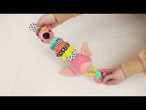 М'яка іграшка Infantino Hug and tug Фламінго музична (216246I)