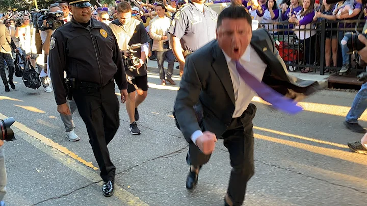 Raw video: Ed Orgeron goes nuts as LSU arrives for...