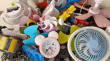 found many mini fans, mini ceiling fans, old toys still alive in the pile of old stuff